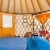 blue yurt, table, curtain