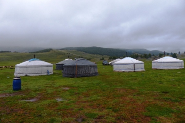 Most of the yurts I saw were actually this grey color.  They look white because they have a polyester cover that is just slipped on to make them "look